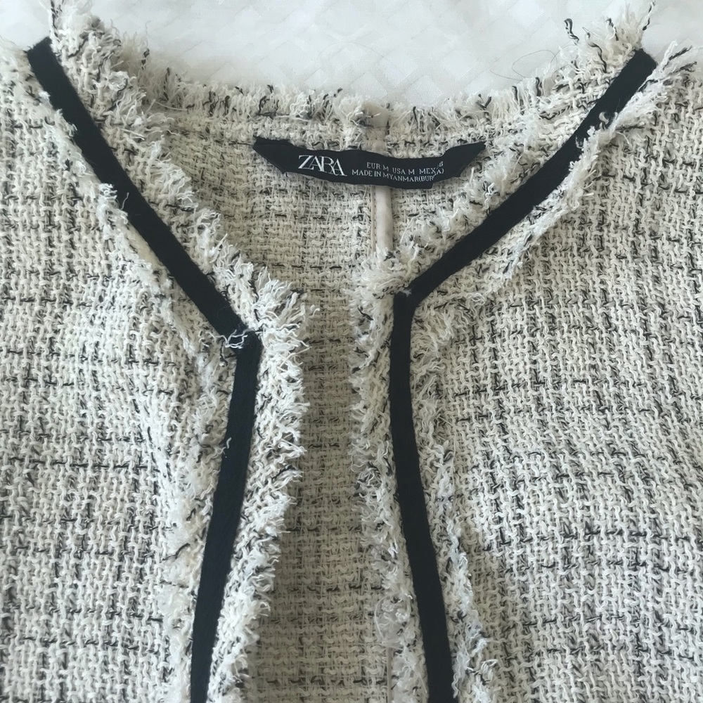 Zara “Tweed” Jacket. Very lightweight. Nice drape. Very fluid. Not restricting.